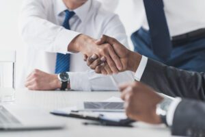 Multicultural businessmen handshake
