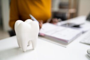 Dental Insurance. Dentist Checking Finance Bill